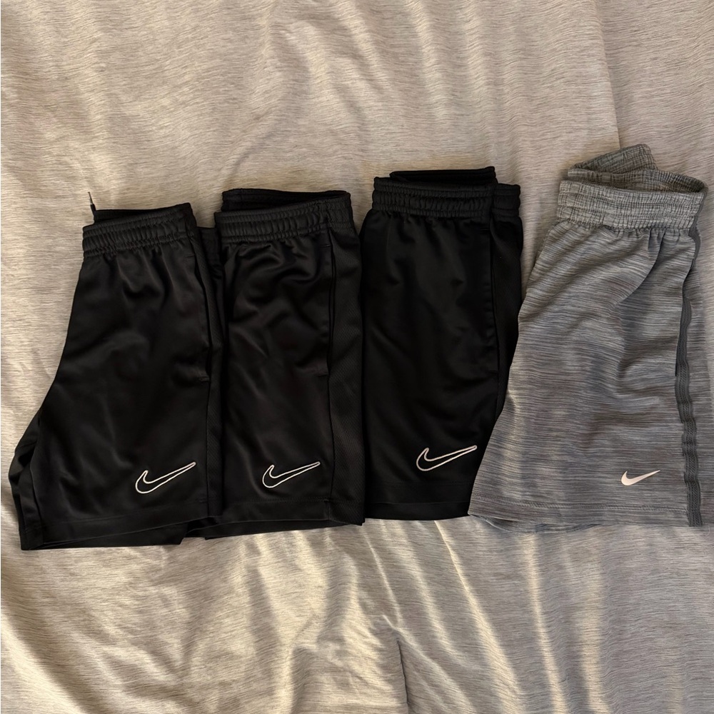 Set of 4 pairs of Boys size Small Nike shorts